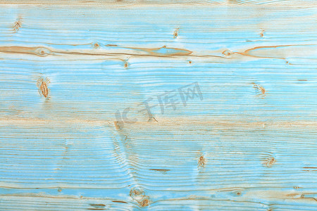 旧彩绘木板的木质质地柔和的蓝色和米色。