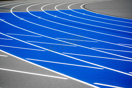 弯曲的蓝色跑步跑道、赛车、田径