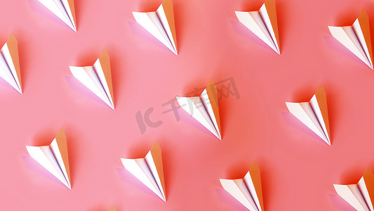 纸飞机粉色摄影照片_珊瑚背景上的纸飞机。