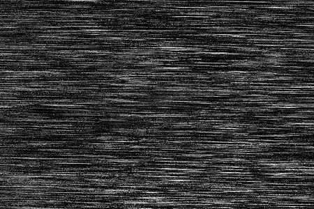 划痕质感摄影照片_带有白色划痕的黑色金属质感。