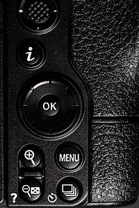 菜单按钮和其他无反光镜相机控制按钮。