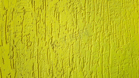 老金石膏墙纹理黄色背景。