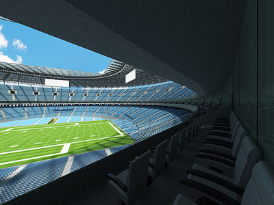 有天蓝色座位和贵宾包厢的大型美丽的现代美式橄榄球场