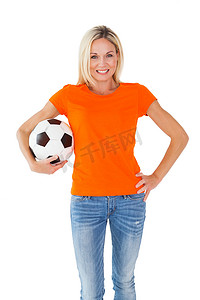 橙色扇形摄影照片_穿着橙色 T 恤的足球迷