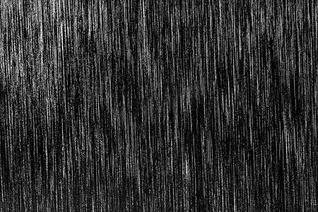 黑色金属摄影照片_带有白色划痕的黑色金属质感。