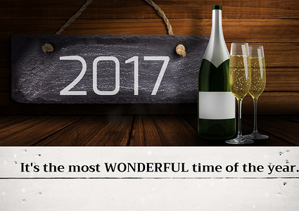 2017 标志和香槟木制背景