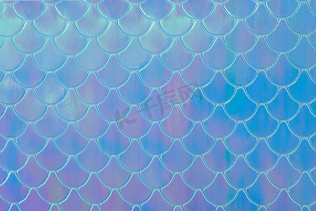 美人鱼铜像摄影照片_皮革表面的抽象纹理全息背景，如美人鱼或鱼鳞。
