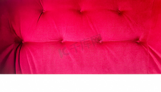 封面背面封面摄影照片_红色沙发的背面。
