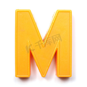 c字母logo摄影照片_磁性大写字母 M