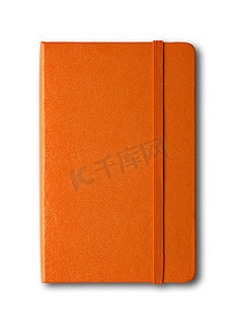 橙色封闭笔记本上白色隔离