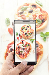 披萨广告摄影照片_迷你披萨