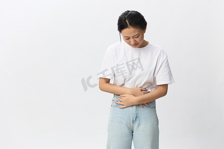 痛摄影照片_女性健康问题胃痛。