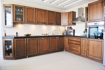 白色的现代厨房摄影照片_新家的现代厨房室内设计