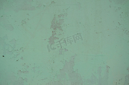 旧漆粗糙旧漆绿墙的纹理，有裂缝