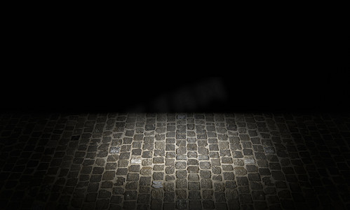 以灰色和纹理色调拍摄的城市街道地面上的鹅卵石结构。