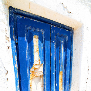 希腊圣托里尼古董村欧洲和白色的蓝色门