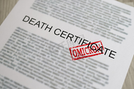 病例证明摄影照片_红色 omicron 印章站在死亡证明文件特写上