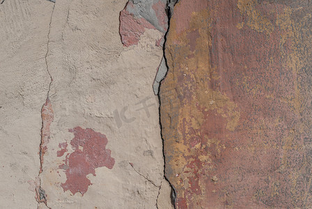 混凝土墙上旧的碎石膏、碎油漆、纹理背景