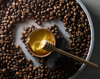 药健康摄影照片_咖啡豆和天然蜂蜜