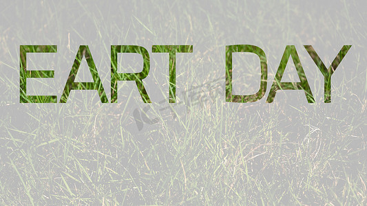 地球日海报摄影照片_地球日一词，字母内有绿草。