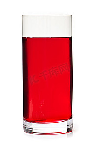 红色果汁摄影照片_玻璃杯中的蔓越莓汁