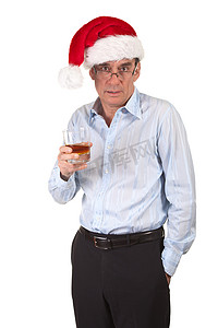 戴着圣诞老人帽子喝得有点醉的商人