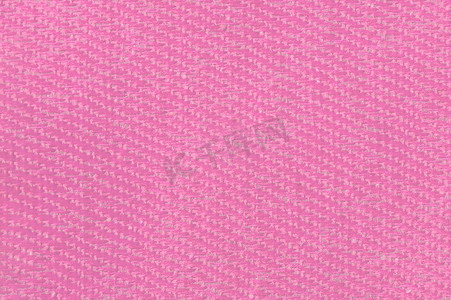 粉红色帆布面料纹理背景。