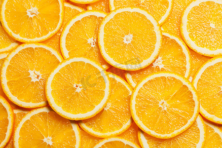 新鲜水果片摄影照片_多彩的橙色水果片