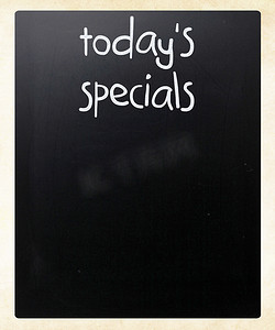 今日战报摄影照片_黑板上用白色粉笔手写的“今日特价”