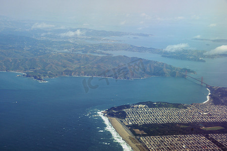 日落金山摄影照片_金门大桥、海洋海滩和旧金山日落区