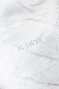 豪华白色毛皮大衣纹理背景，人造织物细节