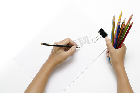 写字的手摄影照片_在白纸上写字的手