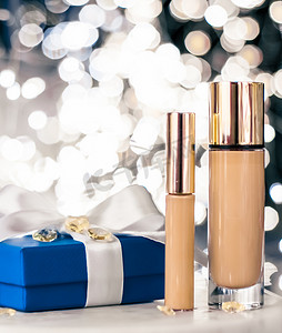 假日化妆基础底座、遮瑕膏和蓝色礼盒、豪华化妆品礼物和美容品牌设计的空白标签产品