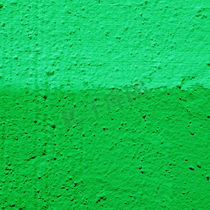 墙上的双色调灰泥有两种色调 - 绿色。