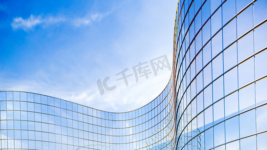 反光玻璃房摄影照片_玻璃建筑的经营理念。