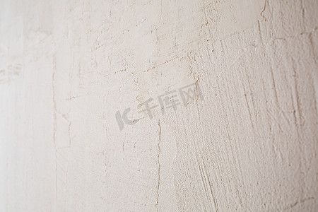白色背景抹灰纹理，白墙上的腻子，混凝土墙纹理背景，水泥墙，石膏纹理，供设计师使用