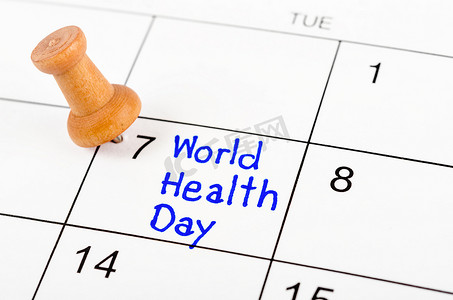 日历中的手写提醒世界卫生日，带木针。 