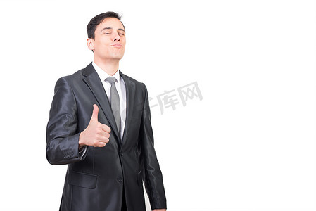好喜欢摄影照片_穿着优雅西装的积极男人竖起大拇指