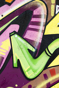 彩色涂鸦墙摄影照片_彩色涂鸦墙城市艺术嘻哈背景，箭头