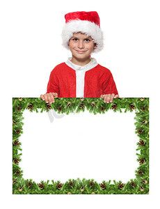 新年新年海报摄影照片_拿着圣诞节海报的男孩