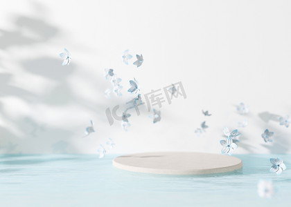 飞花摄影照片_讲台上有水和白色背景上的飞花。