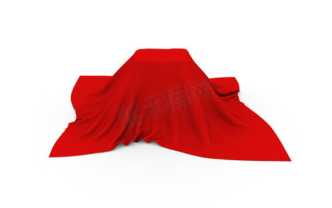 红布盖着的车摄影照片_用红布覆盖的矩形物体，白色