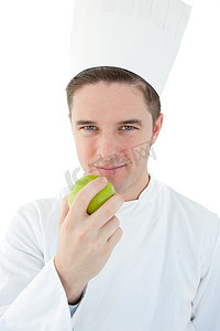 厨师动画摄影照片_拿着青苹果的厨师