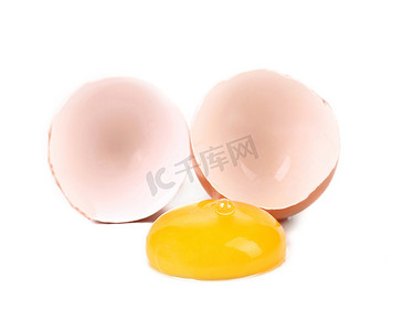 蛋黄摄影照片_鸡蛋破了。