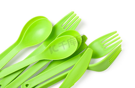 器皿摄影照片_塑料叉子、勺子和刀