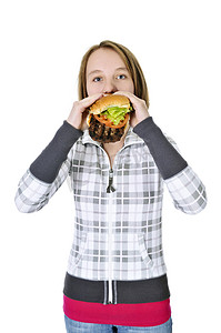 吃大汉堡的十几岁的女孩