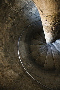 楼梯石摄影照片_螺旋石楼梯。