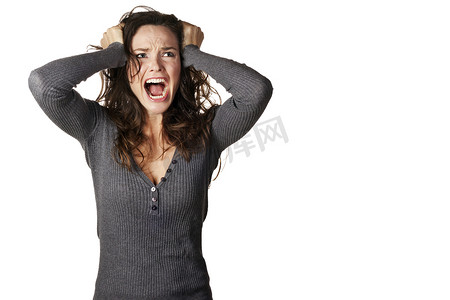 女性生气摄影照片_沮丧和愤怒的女人尖叫