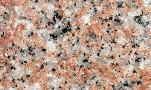 粉红色花岗岩岩石抛光表面纹理细节可见