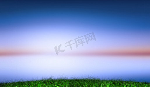 蓝色和紫色天空下的绿草